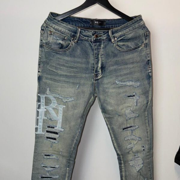 Amiri Ripped Text Embroidered Stretch Slim fit Jeans